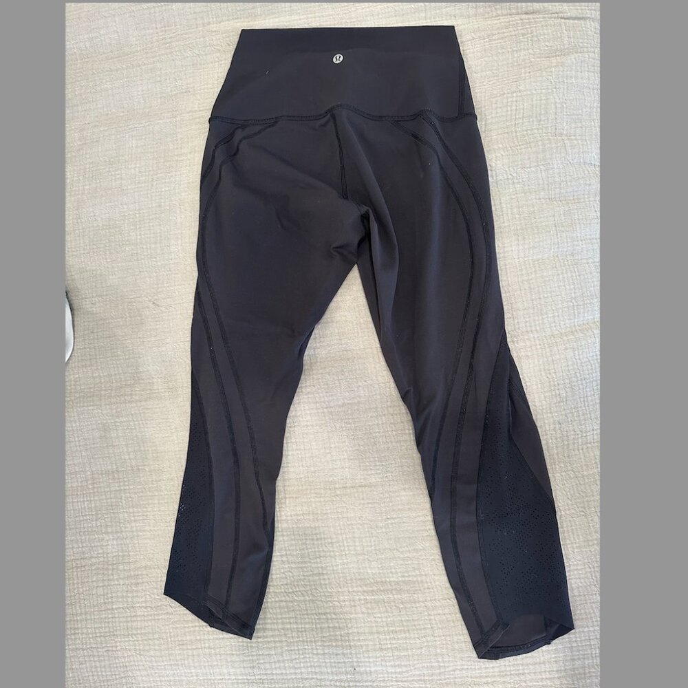 Black lululemon leggings with cutout detail